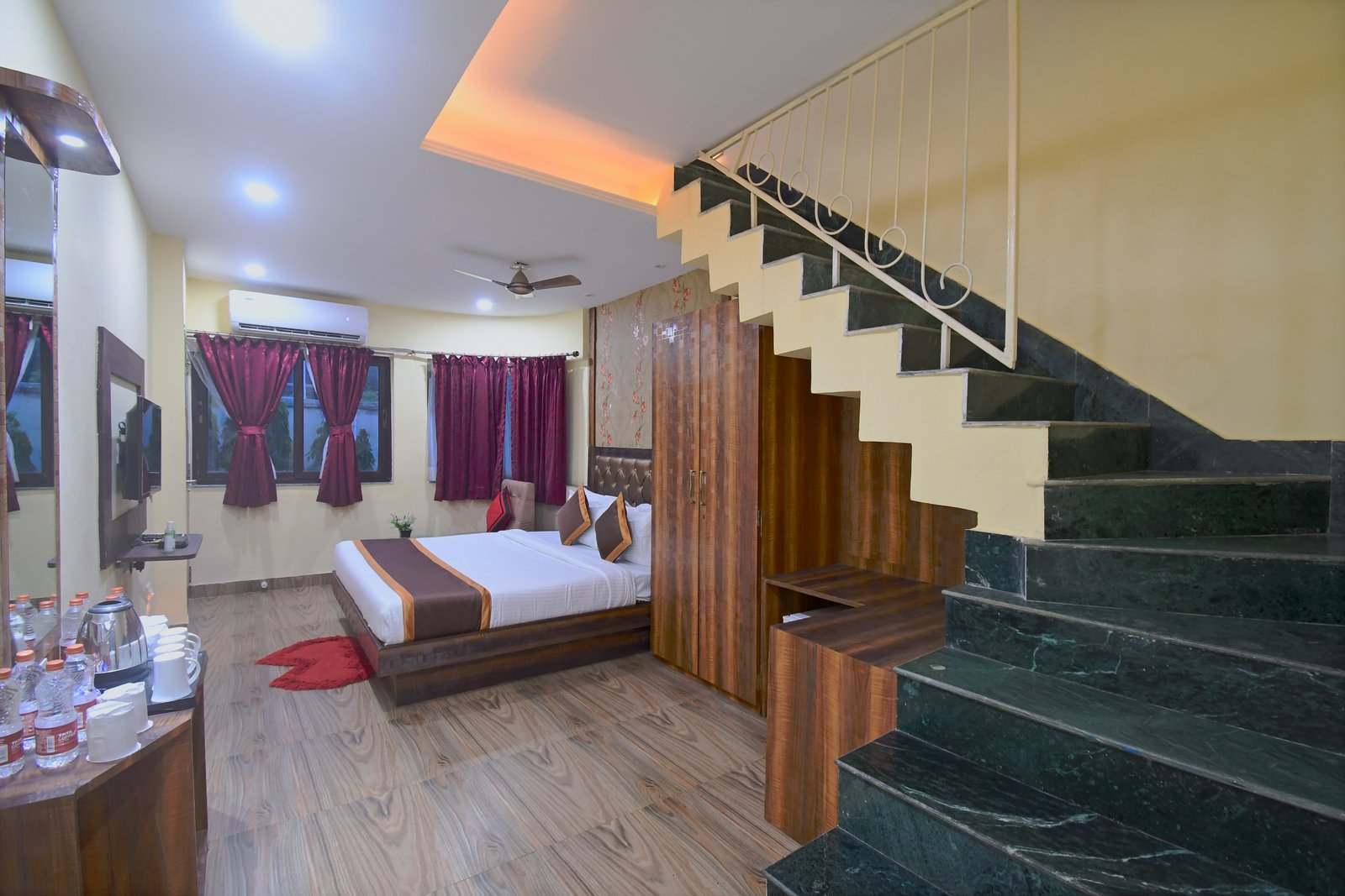 Full view showcasing the elegant two-story layout of the Duplex Room