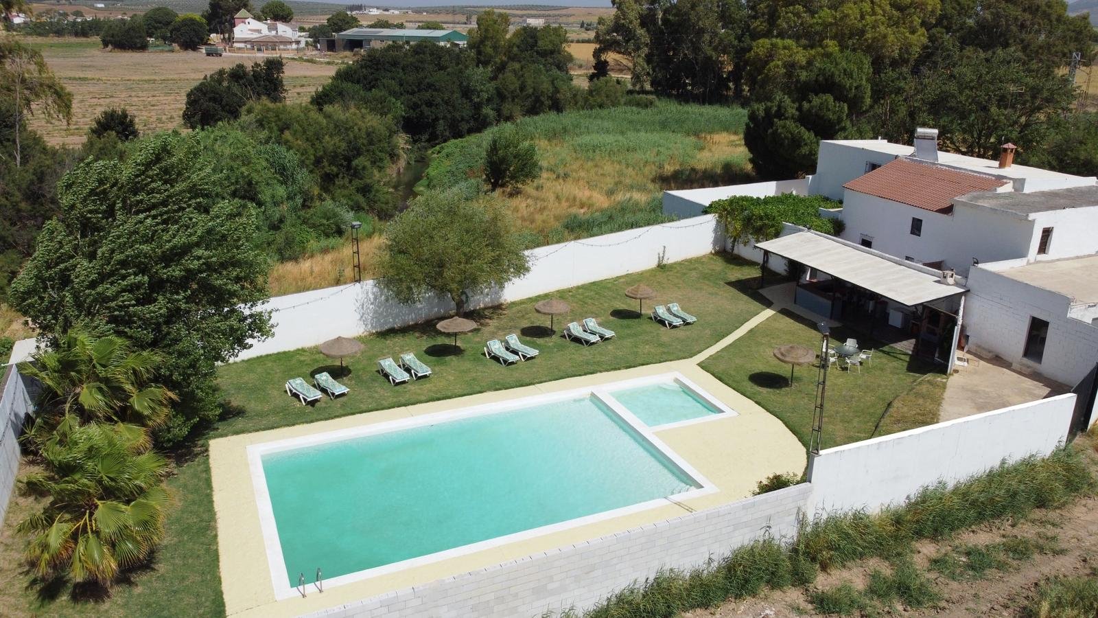Aerial view of Cortijo La Vega with the pools