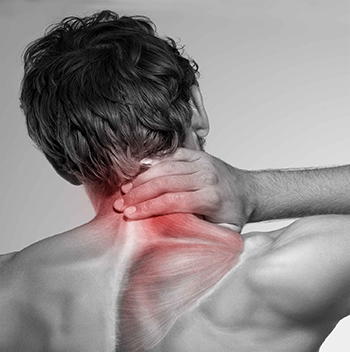 Man from behind with dark hair, holding his neck with his hand, with red/pink pain highlighting on neck and shoulder area