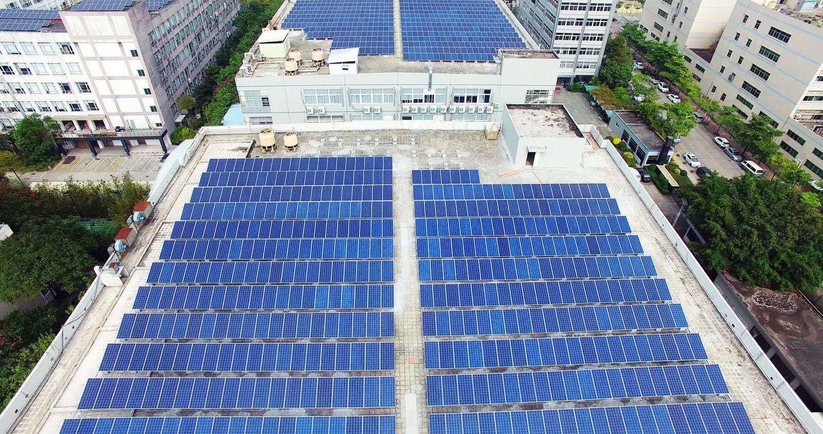 Aerial view of commercial rooftop solar array