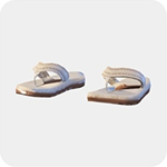 A pair of cream thong sandals with a ruffled fabric strap and a flat tan sole.