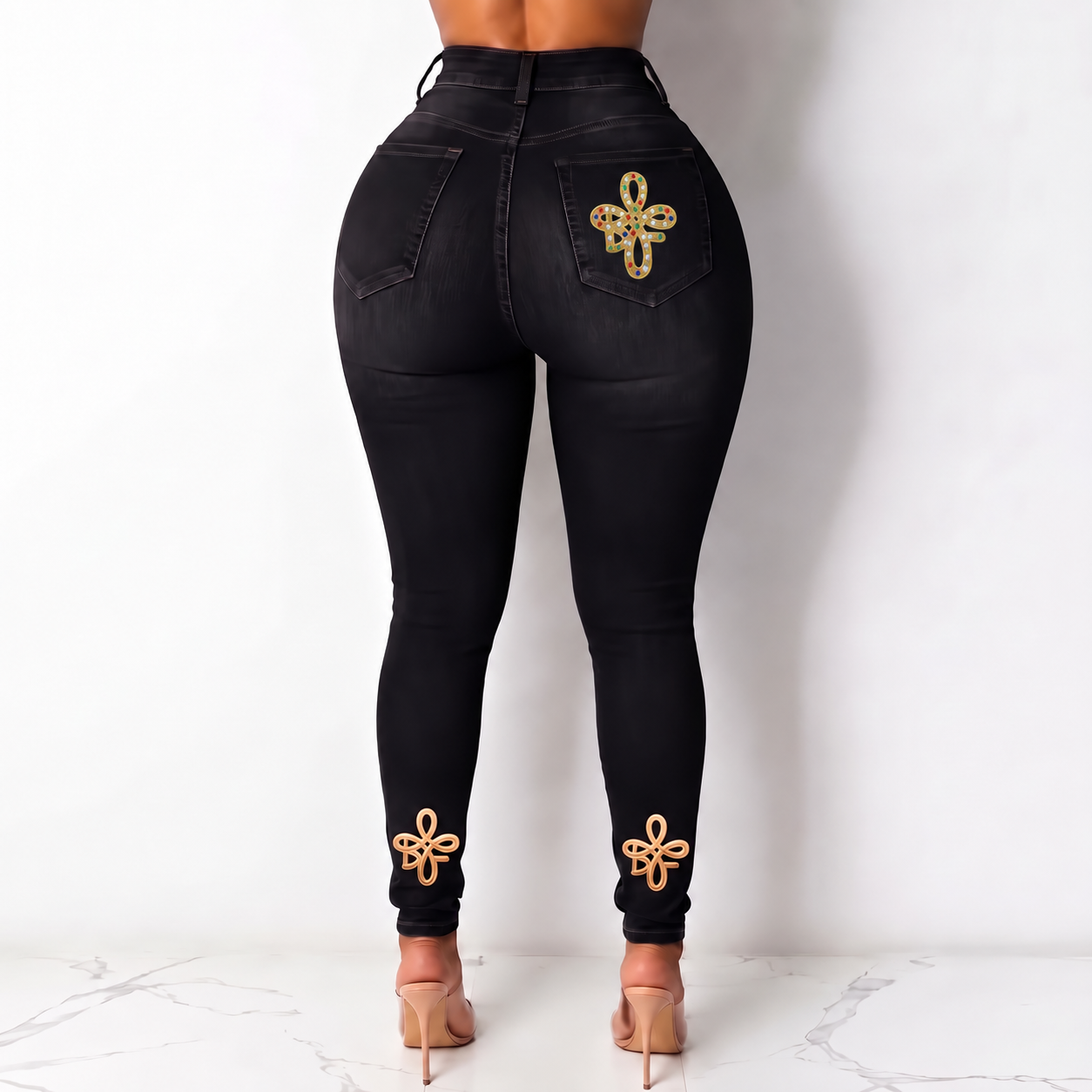 Phase 1 Skinny high-rise skinny jeans by Biji French in black with the signature jeweled monogram back pocket
