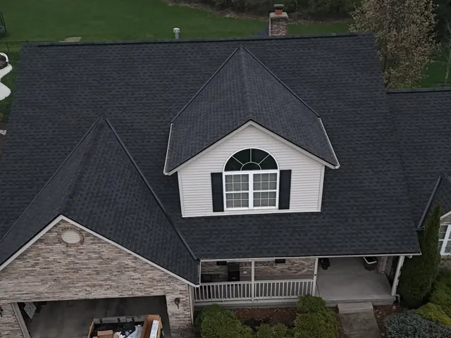 Drone view of a finished dark shingle roof by XPRO ELITE in Middletown, Ohio