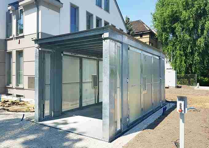 modern automated parking structure with glass and steel