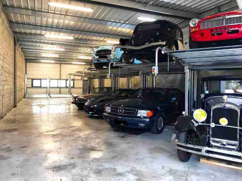 Interior of an automatic parking lot with multiple cars parked on different levels