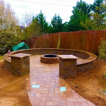 Curved fire pit patio with matching seat walls