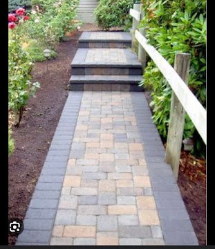 Stone walkway with decorative paver pattern