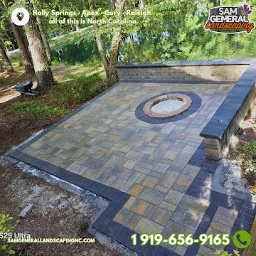 Custom stone fire pit with paver surround