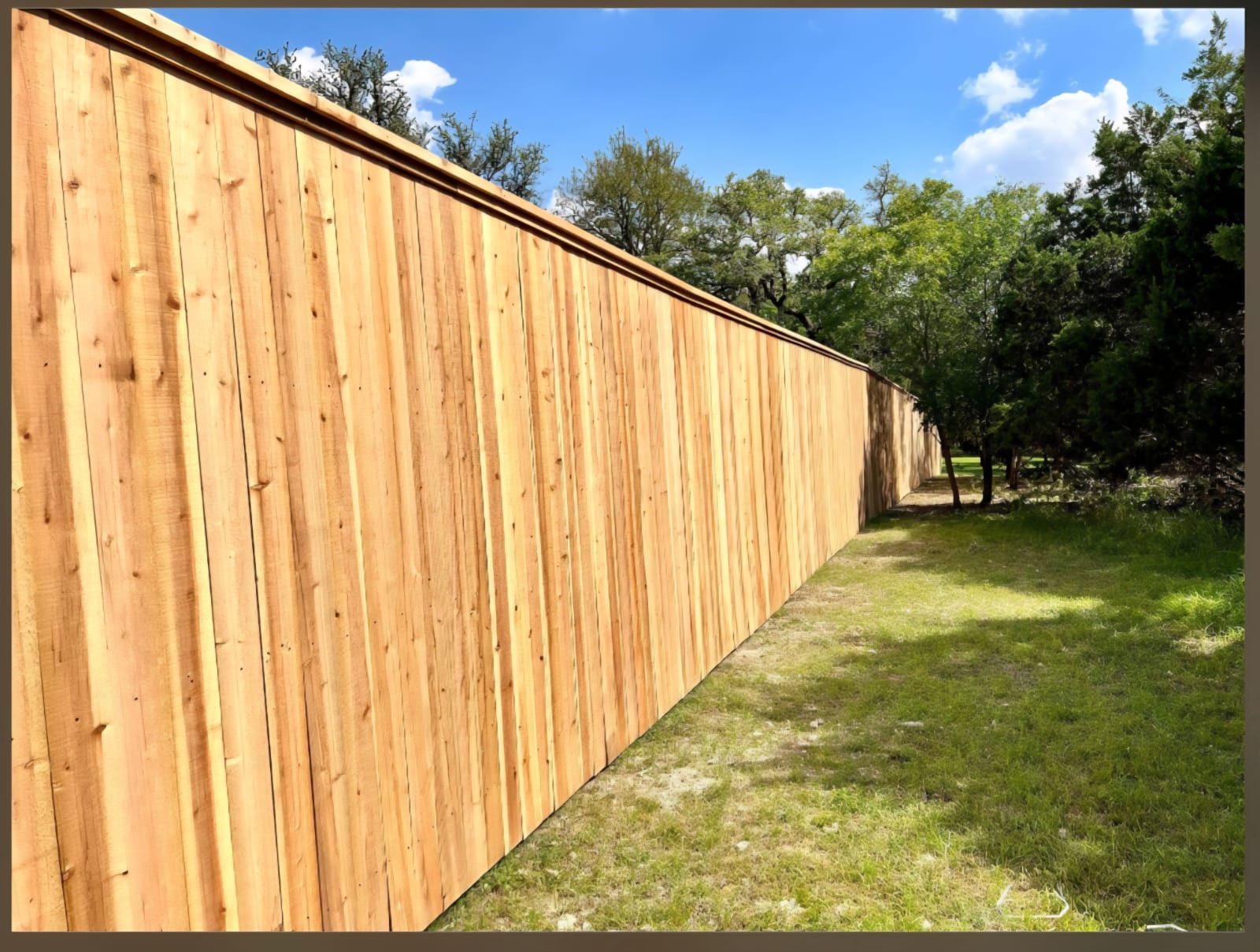 Completed cedar privacy fence installation
