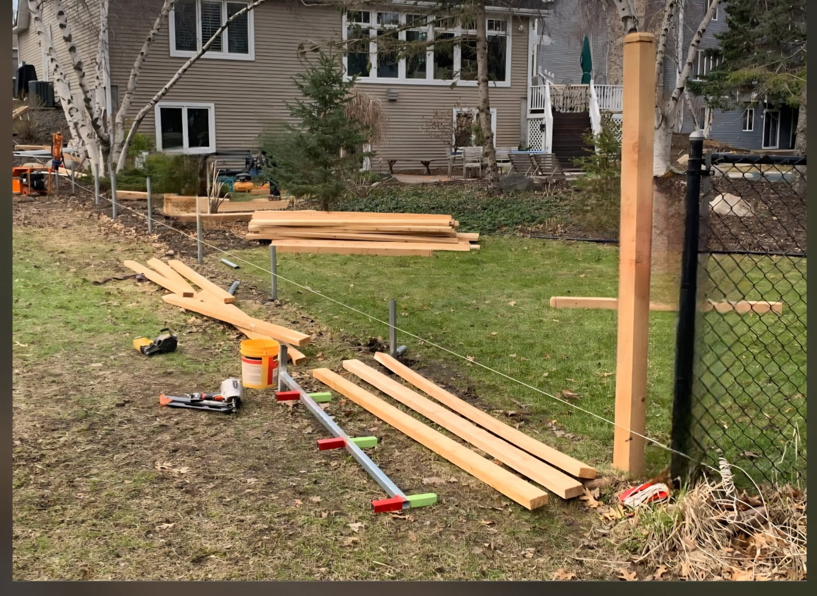 New fence lumber and post installation
