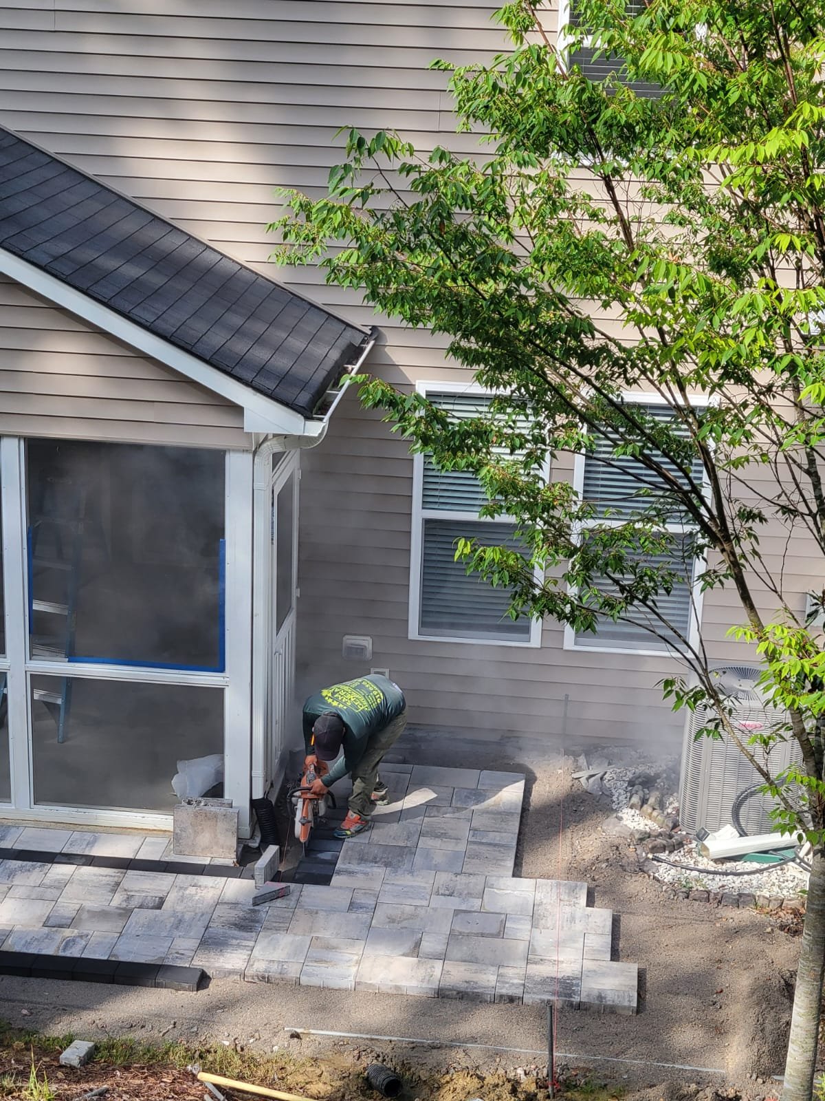 Paver Patio — Cutting & Fitting Around Sunroom