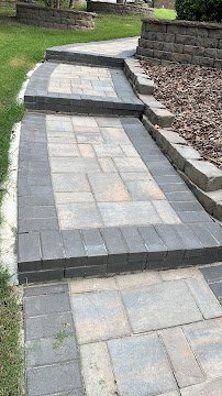 Curved stone walkway with landscape borders