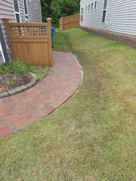 Curved residential walkway with border