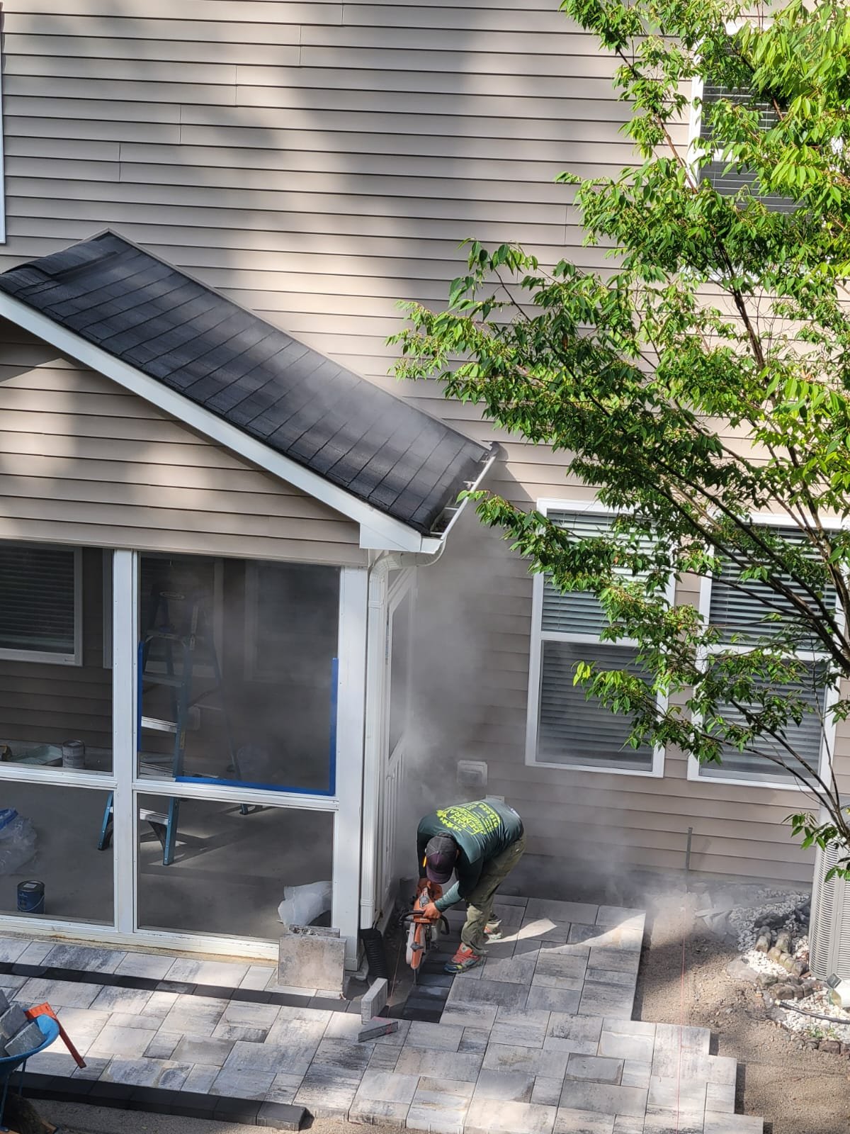 Paver Patio — Precision Cutting Along Sunroom