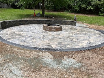 Completed backyard fire pit entertainment space