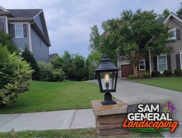 Residential lawn with landscape lighting near Garner