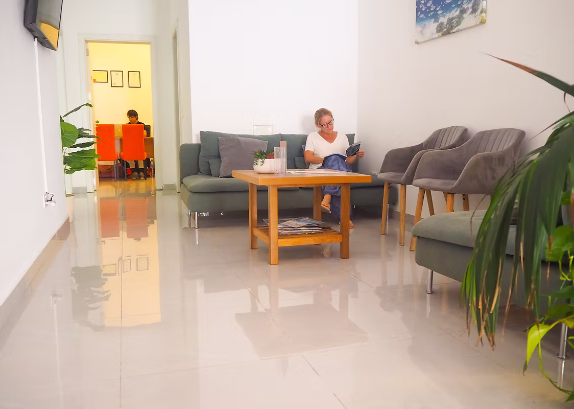 The waiting room at The Red Door Clinic in Mellieħa