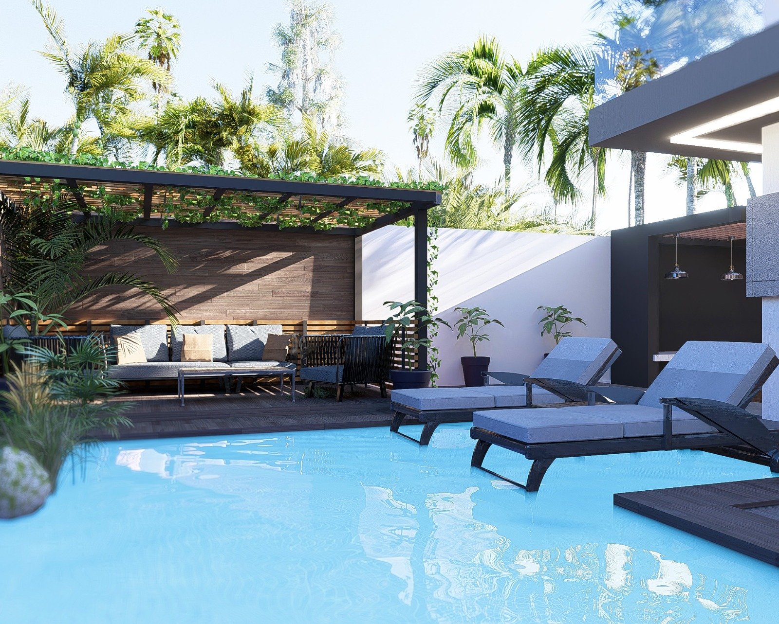 Espace lounge et chaises longues au bord de la piscine