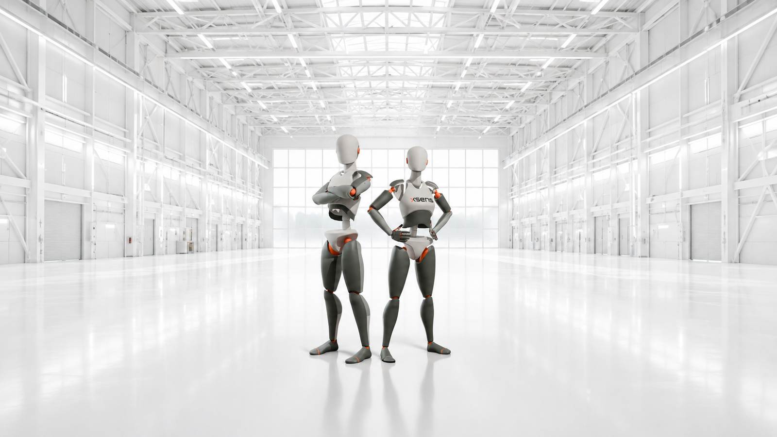 Two Xsens motion capture suits in a bright industrial space