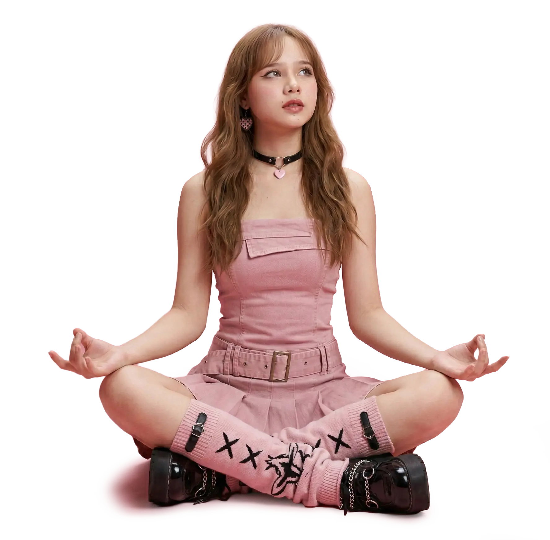 Woman in pink dress in meditation pose