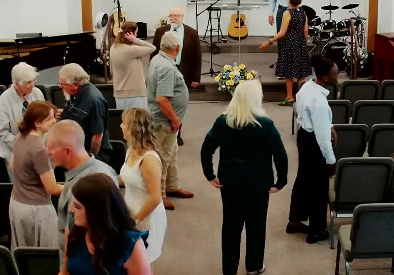 Friends connecting outside after church