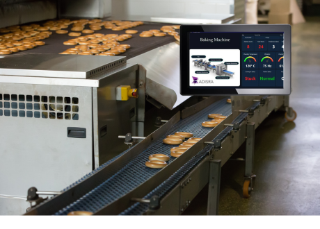 Industrial touch panel PC displaying a SCADA HMI dashboard
