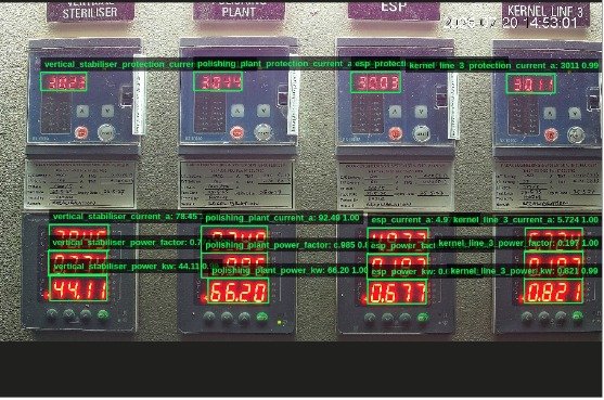 Facilities engineer monitoring building automation equipment with edge controllers, distributed I/O, fire alarm, car park, and water systems in a modern Malaysian building