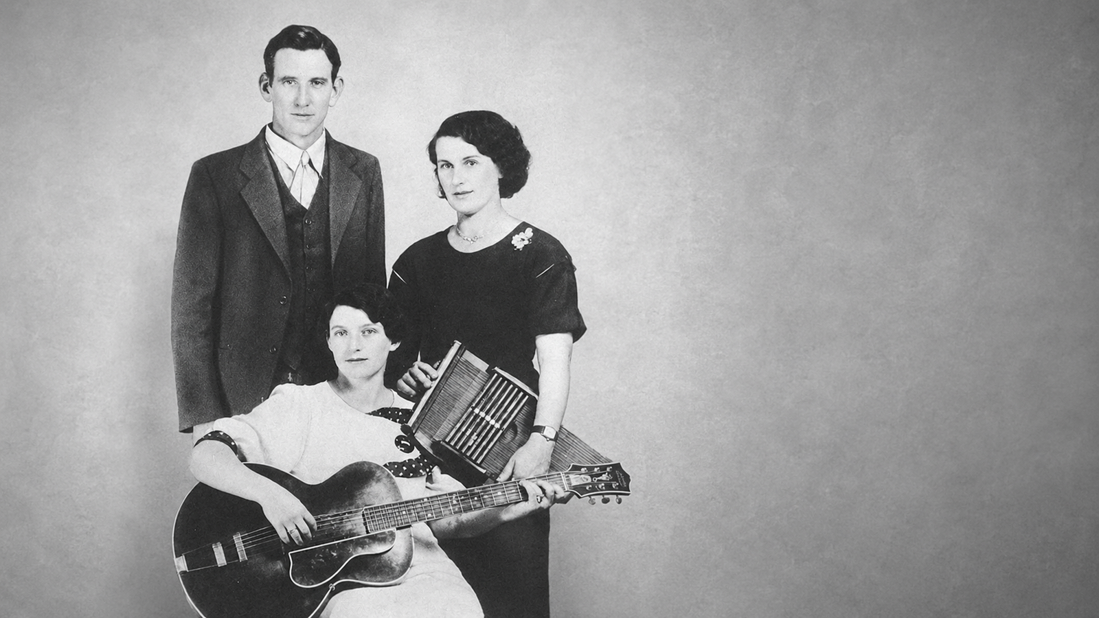 La Familia Carter con guitarra y acordeón