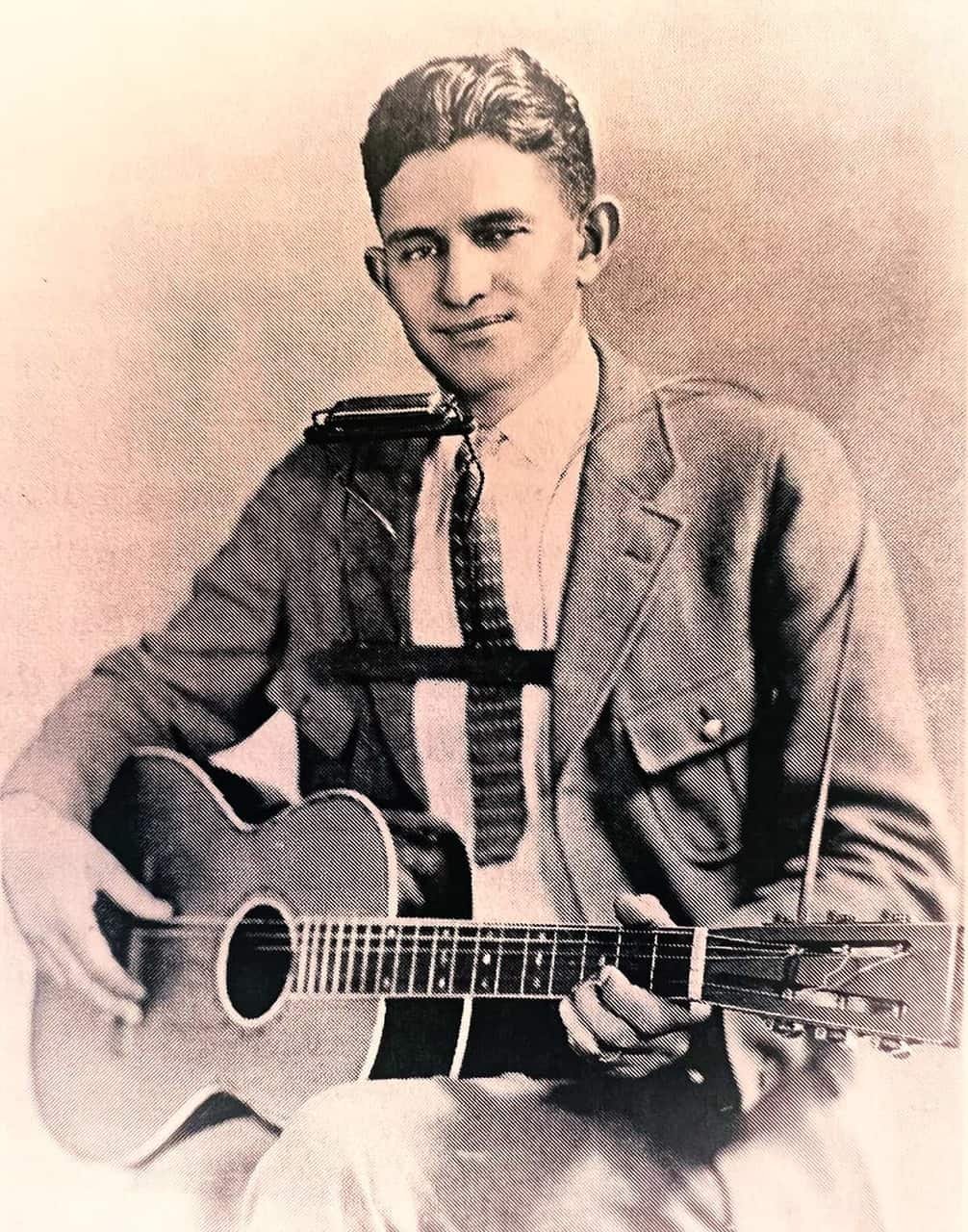 Early Appalachian musicians gathering on a wooden porch with acoustic string instruments