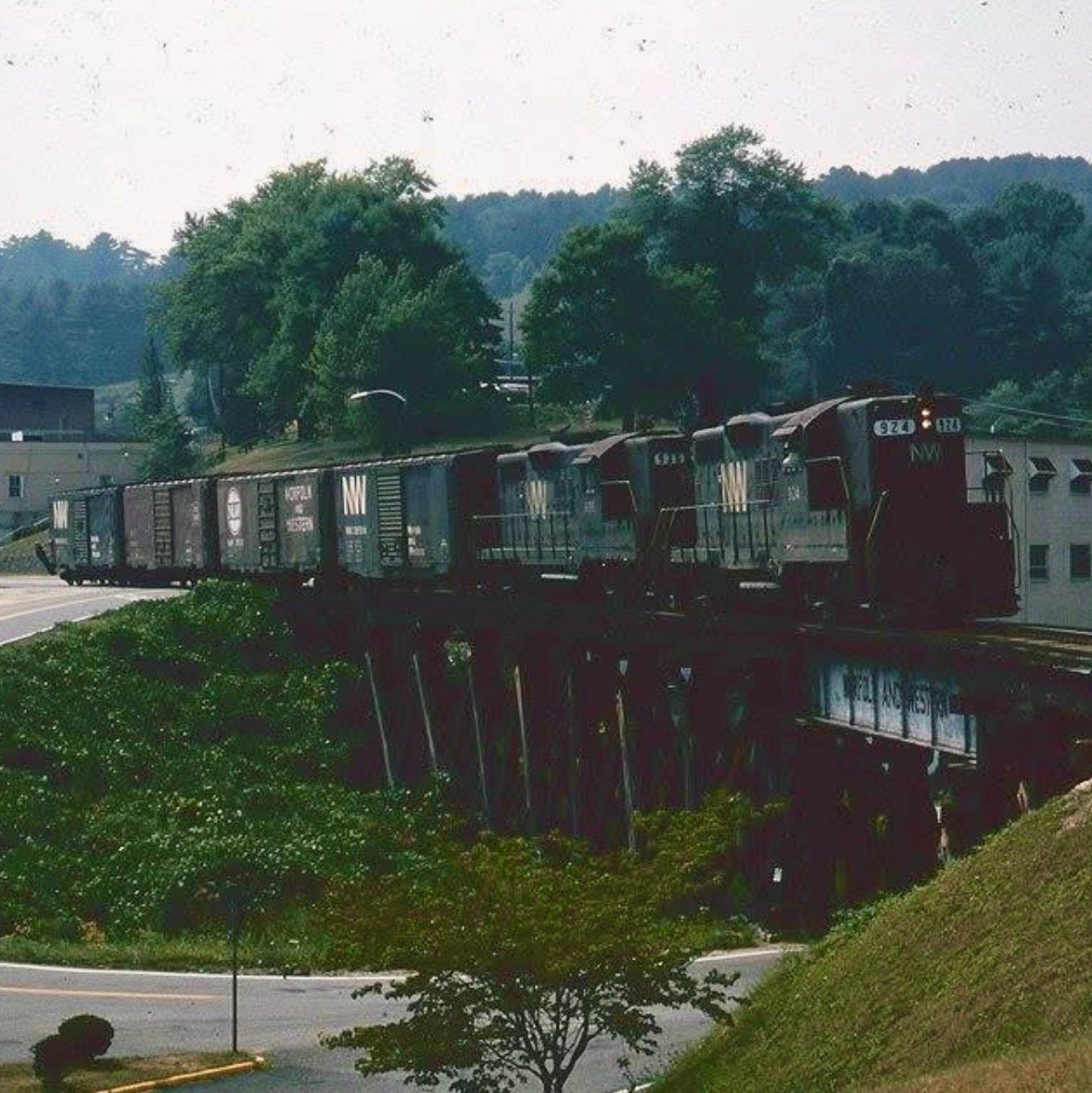 Archival black and white photograph showing the original Norfolk & Western railway tracks cutting through the rugged New River Valley