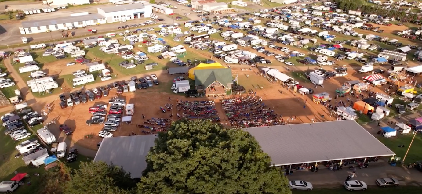 Galax Fiddlers Convention in Felt Park with stage and campers.