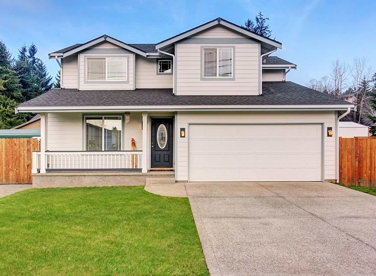 Modern home with concrete driveway