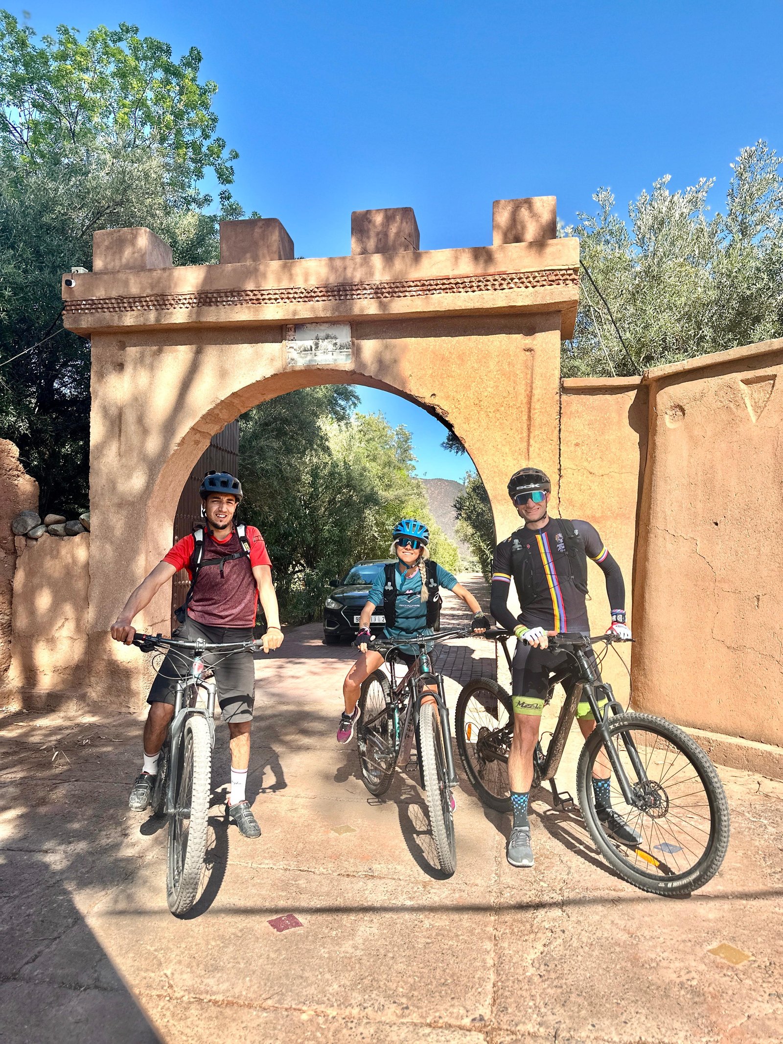 A gravel cyclist riding a dirt piste through the High Atlas mountains of Morocco