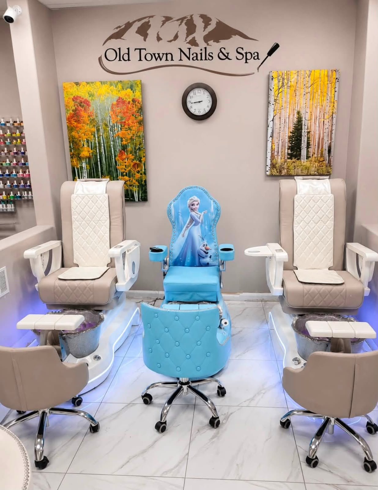 Comfortable pedicure chairs and the blue children’s pedicure chair at Old Town Nails & Spa