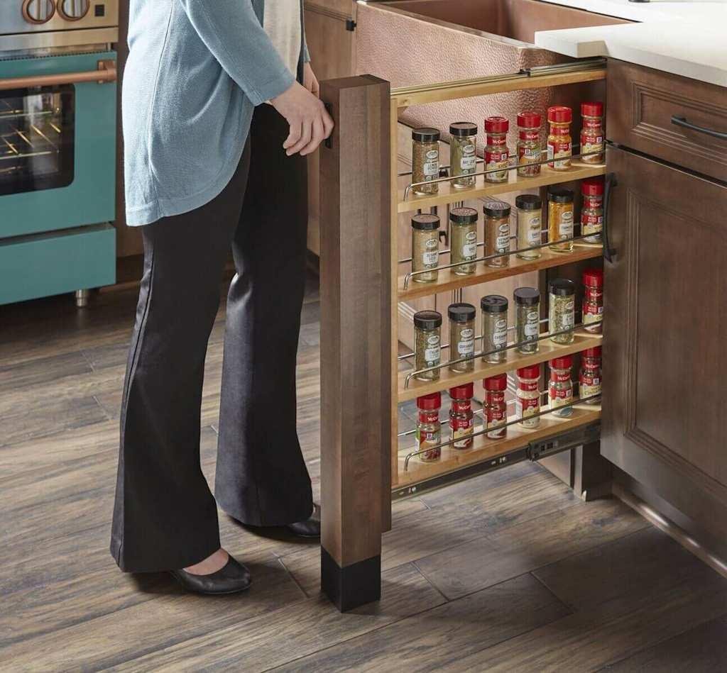 Pull-out spice rack organizer built into new kitchen cabinetry