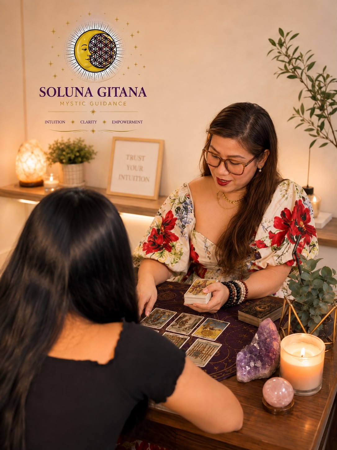 Soluna Gitana founder offering spiritual guidance with tarot cards and crystals