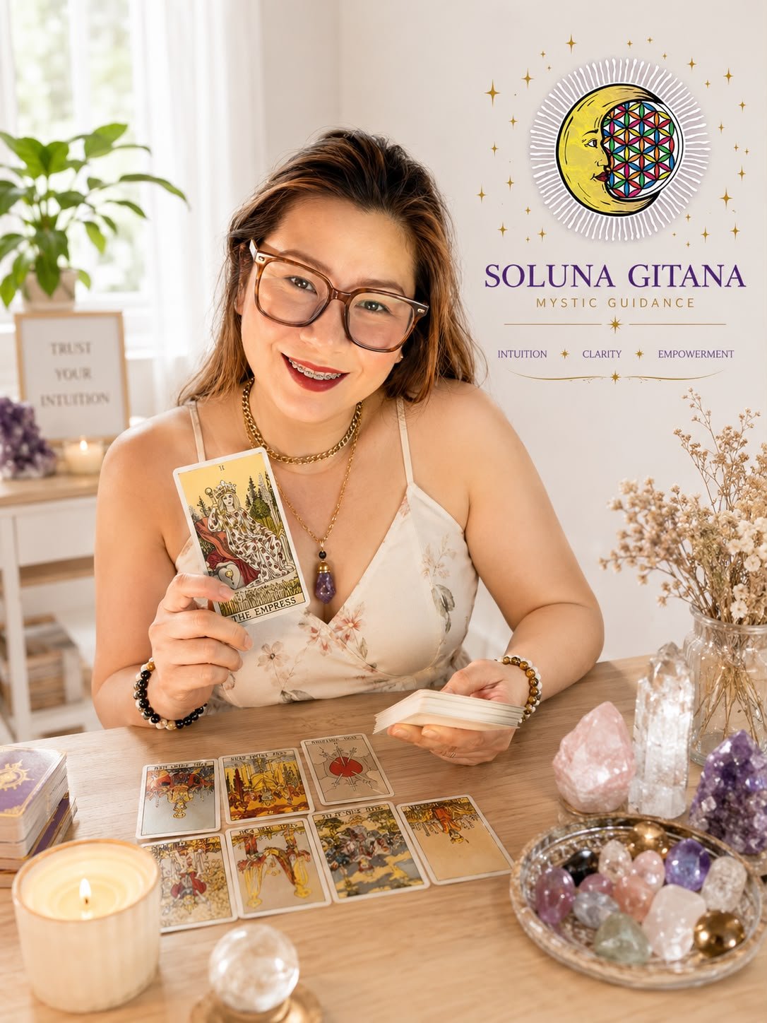 Soluna Gitana spiritual practitioner holding crystals for healing session
