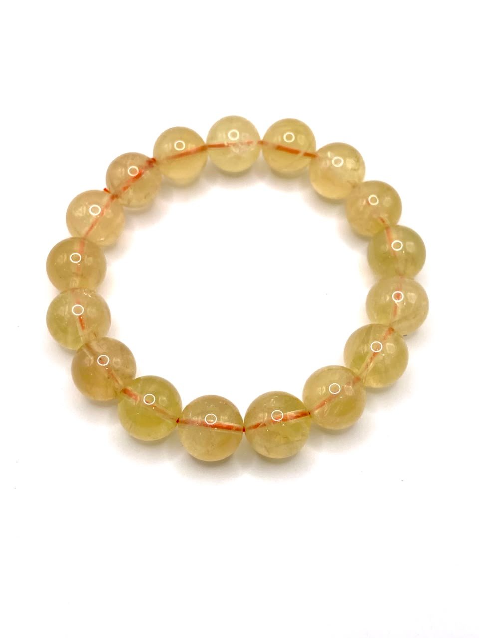 Beautiful citrine bracelet featuring polished golden citrine beads, handcrafted for abundance, joy, prosperity, and positive spiritual energy Citrine crystal bracelet by Soluna Gitana - handpicked golden healing stones for abundance, joy, and positive energy