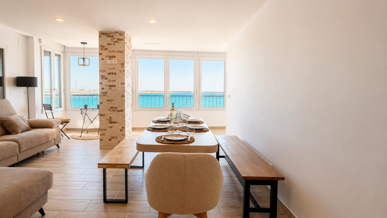 Bright living room with large windows facing the Mediterranean in Torrevieja