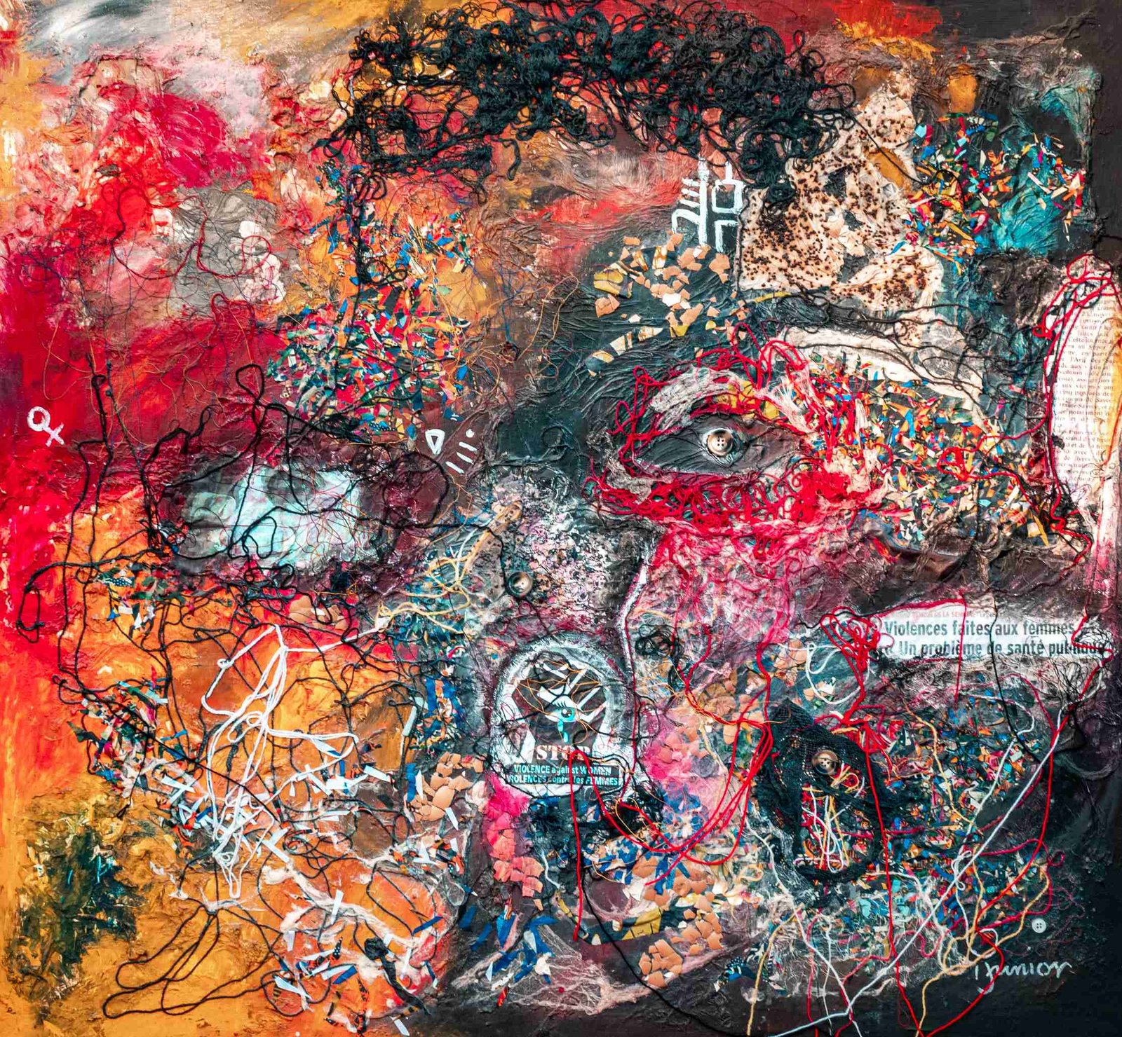 Abstract painting with a face-like composition, featuring intricate textures, threads, and text including 'STOP VIOLENCE against WOMEN' in French and English, set against a vibrant background of red, orange, black, and grey.