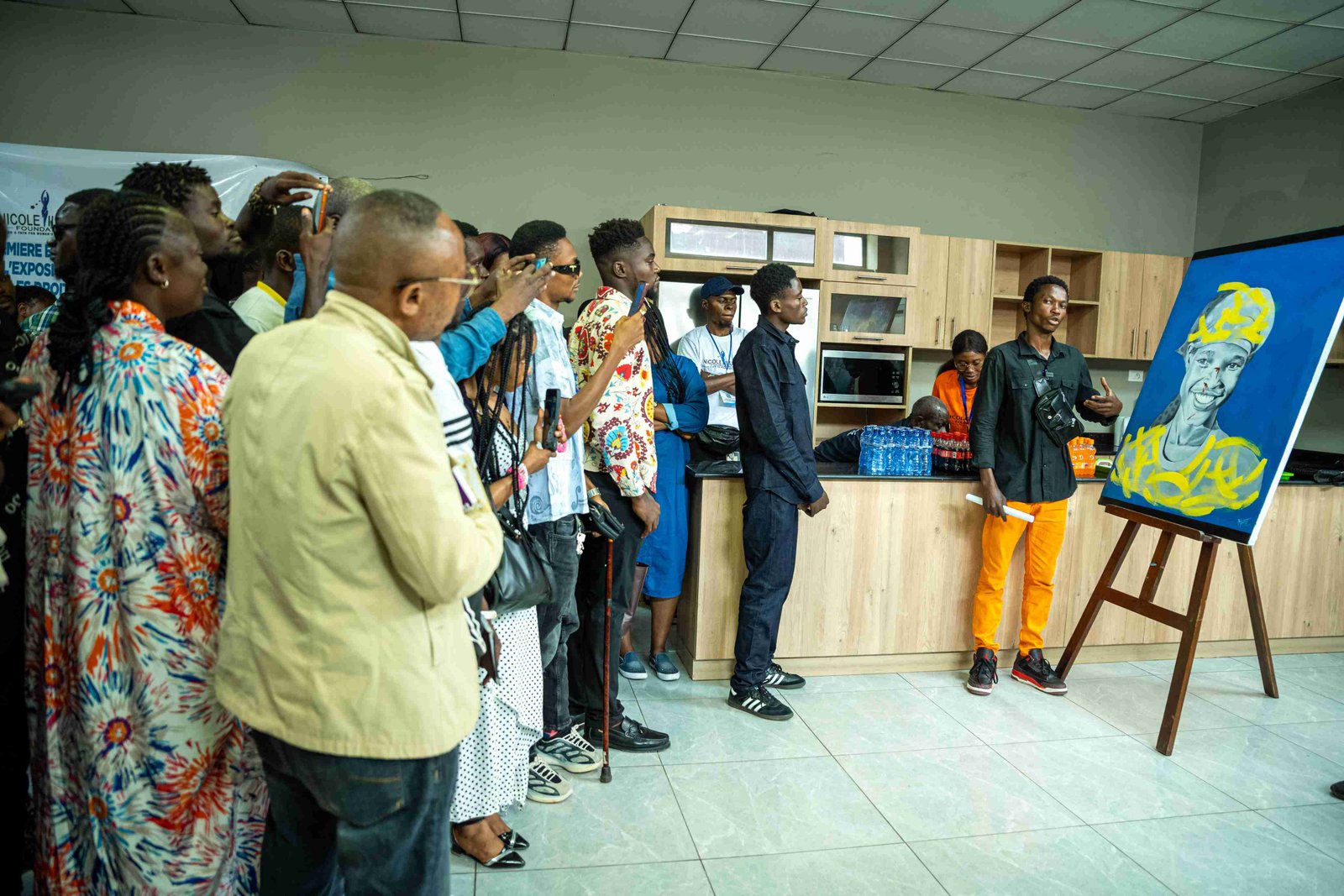 People viewing art at an exhibition event