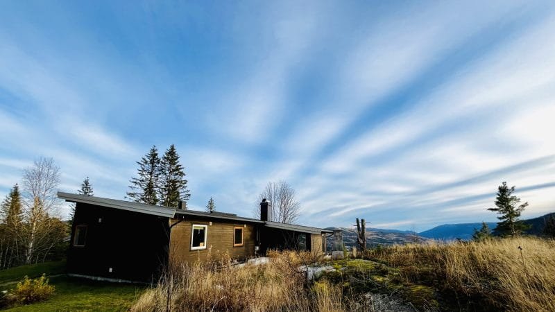 Outdoor deck with hot tub/jacuzzi, mountain valley view, trees