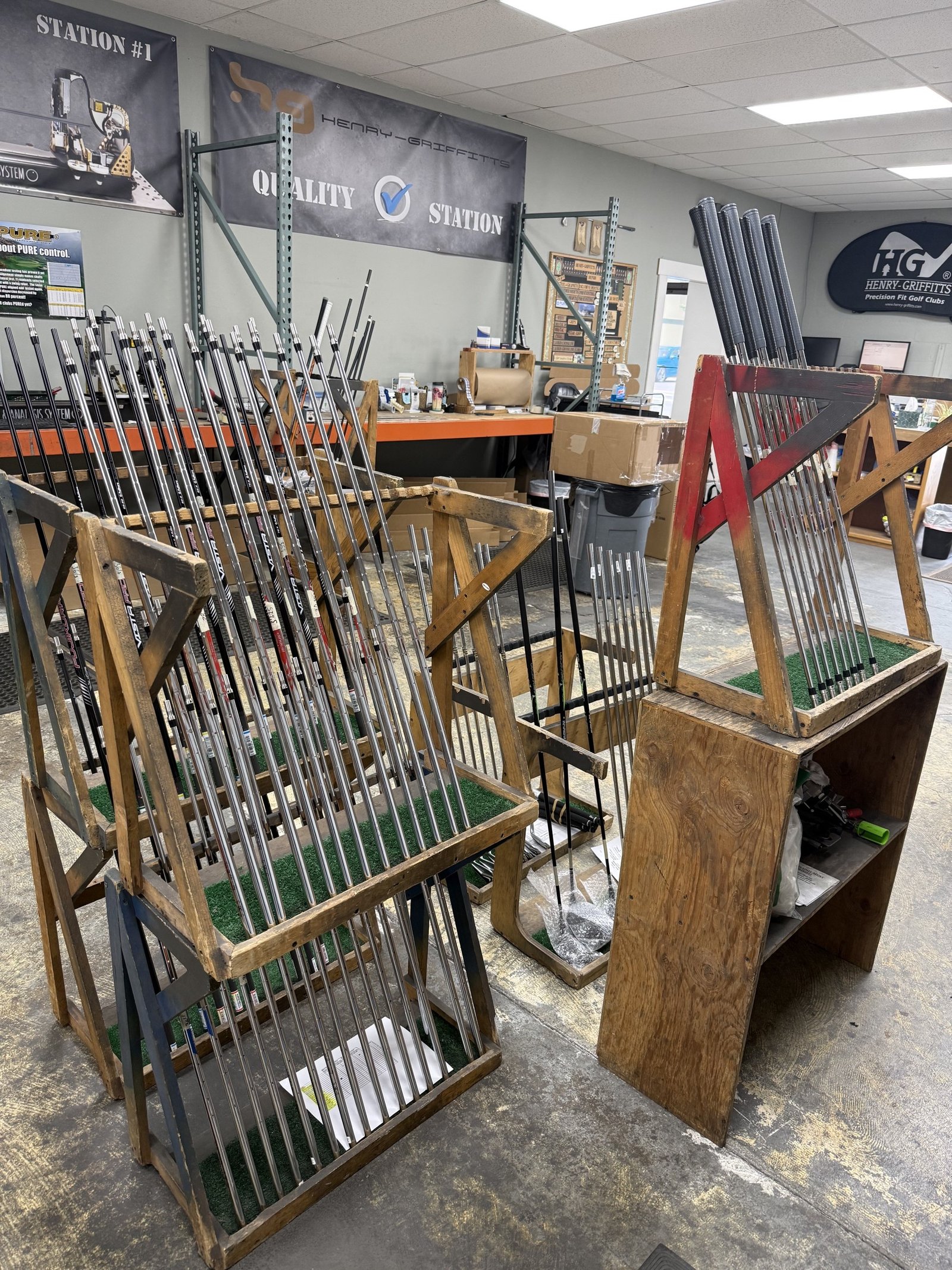 Henry-Griffitts club fitting shop with racked shafts and built clubs
