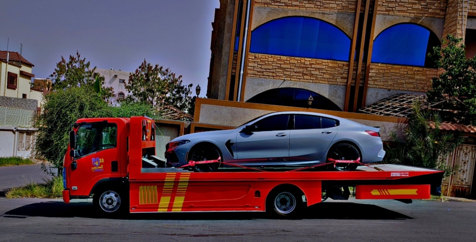 سطحة الرياض تنقل سيارة فاخرة
