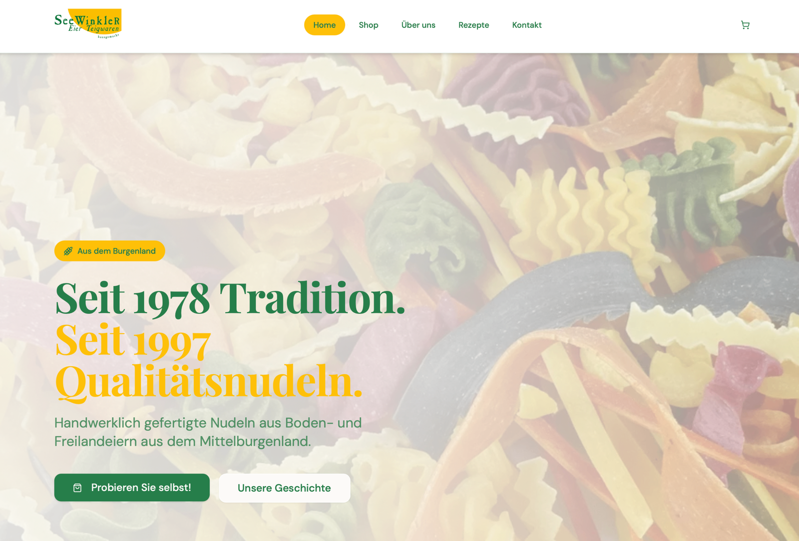 Startseite der Seewinkler Eier-Teigwaren Website mit bunten handgemachten Nudeln im Hintergrund