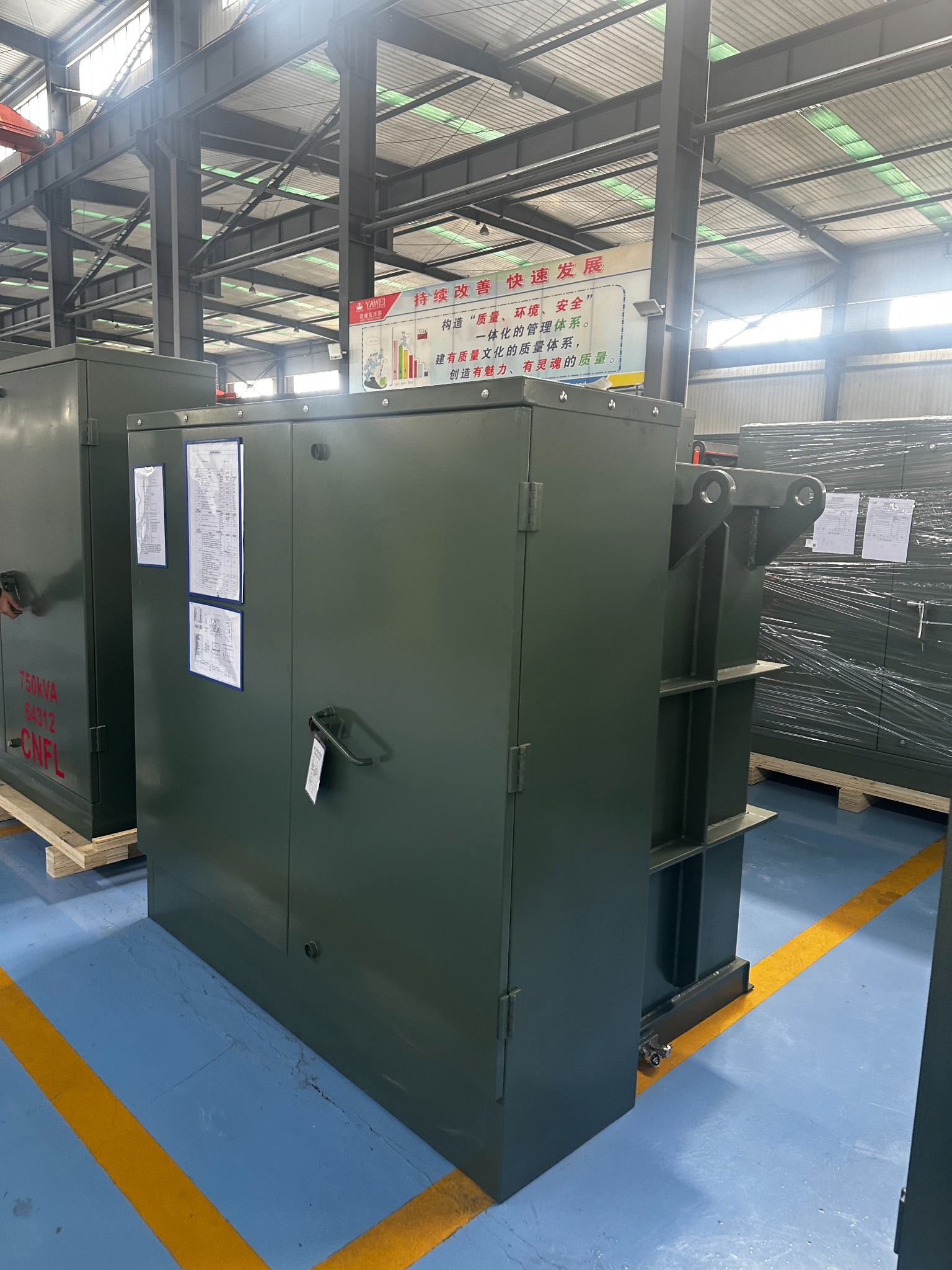 Pad mounted transformer units in factory prepared for project delivery review