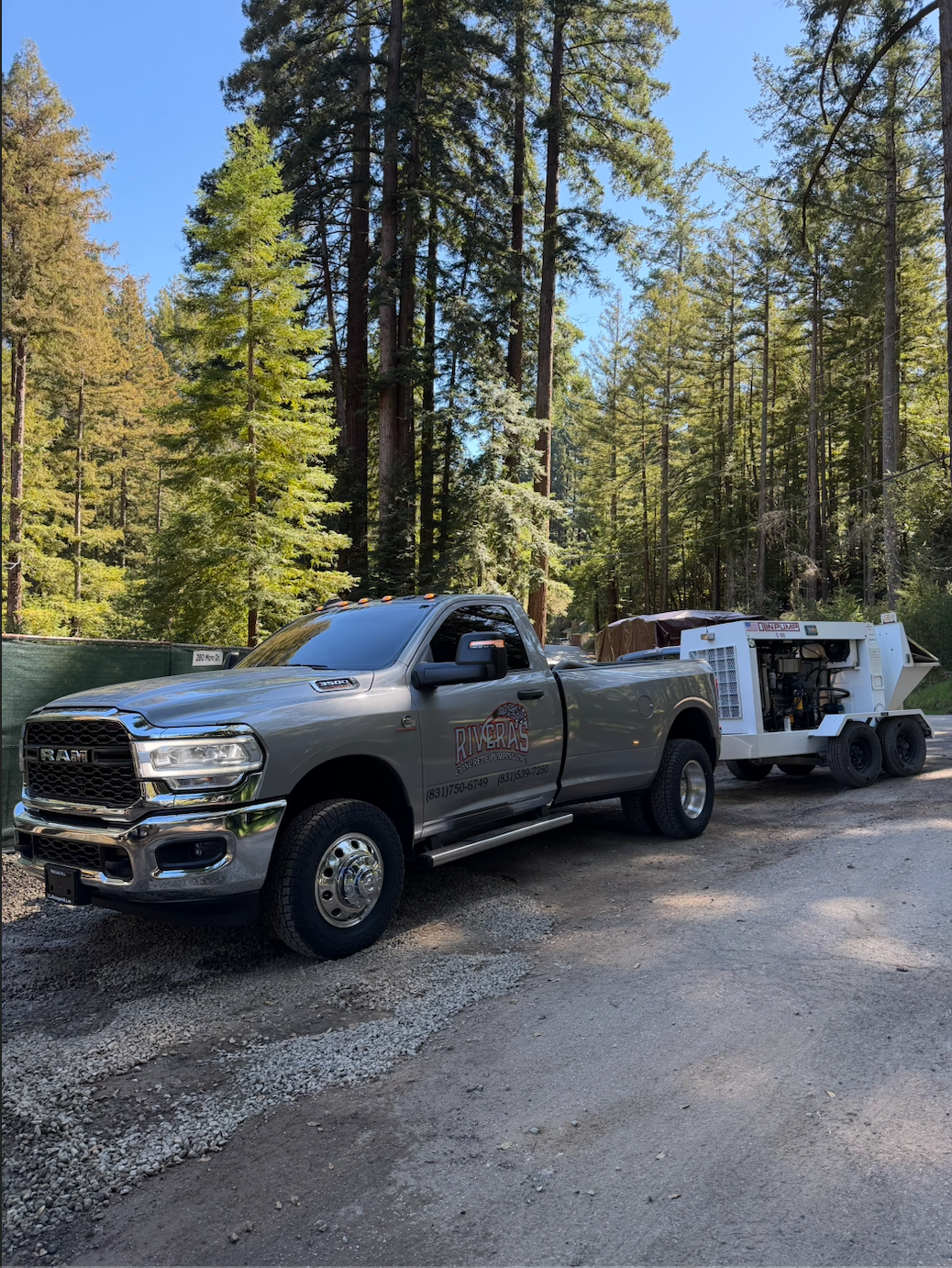 Concrete pumping truck in action at construction site